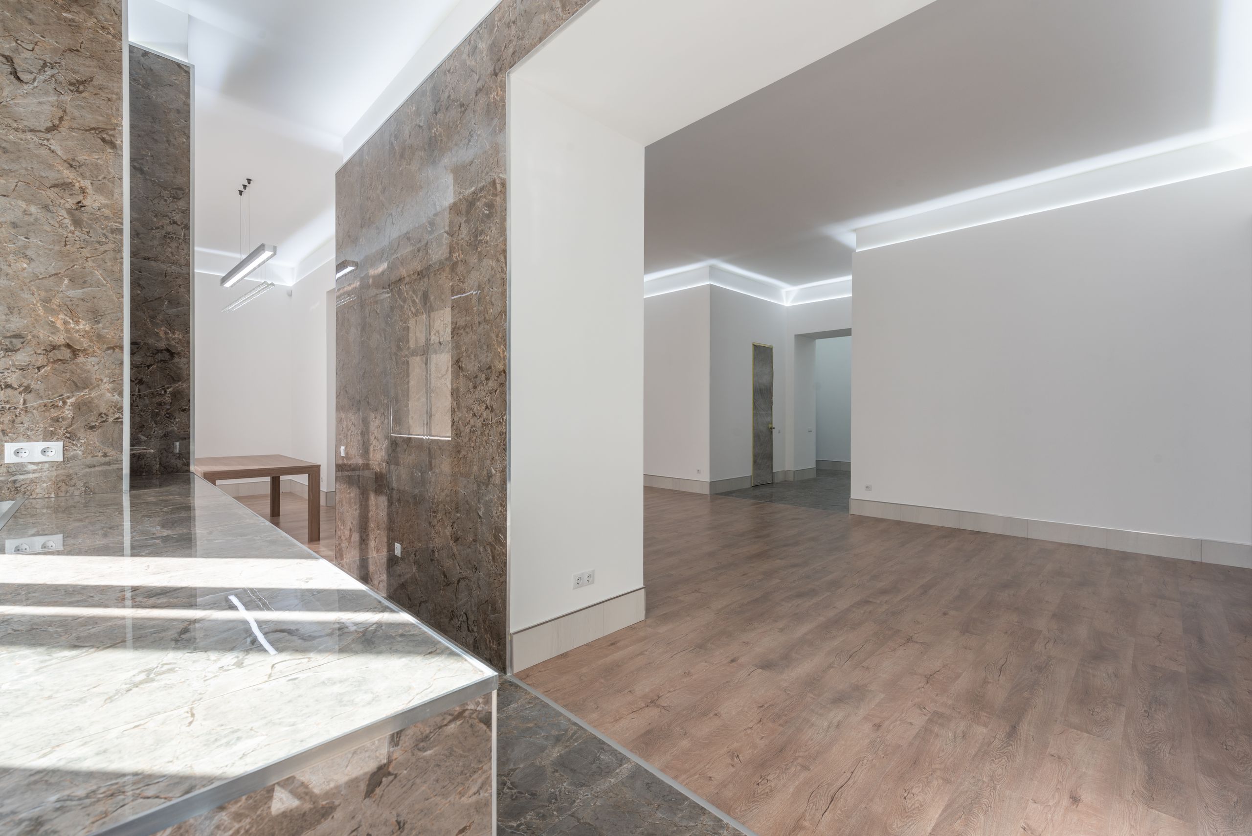 Explore this elegant, well-lit interior featuring marble accents and contemporary design.
